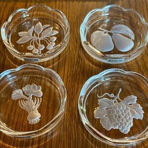 Set of four glass coasters.